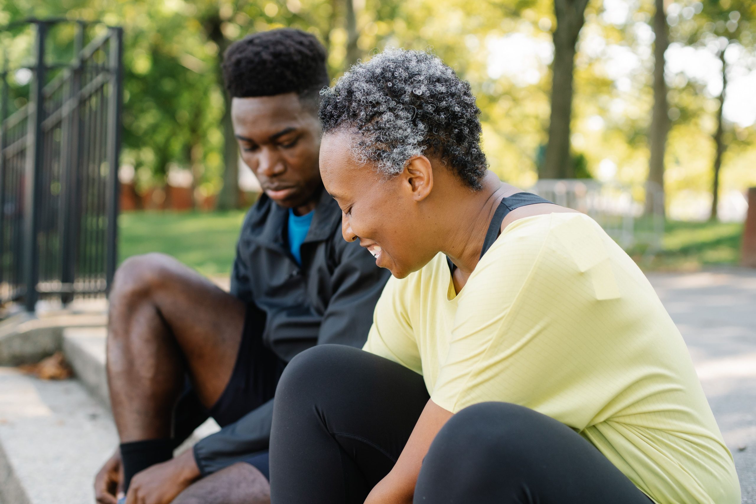 A Black elder and Gen Z sharing conversations and life lessons.