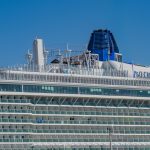 The cruise ship is getting ready to sail away.
