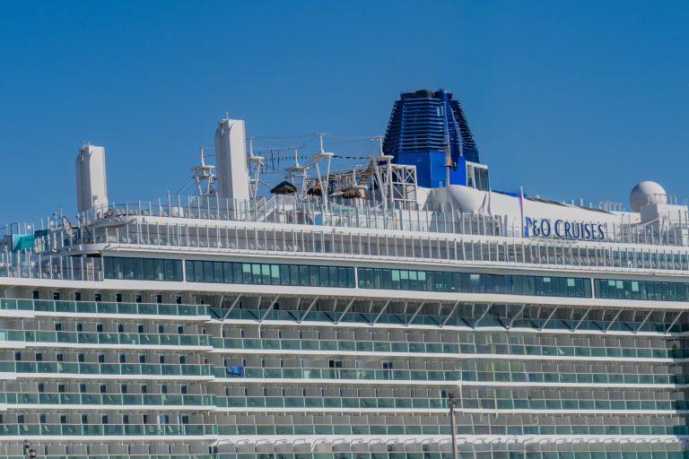 The cruise ship is getting ready to sail away.