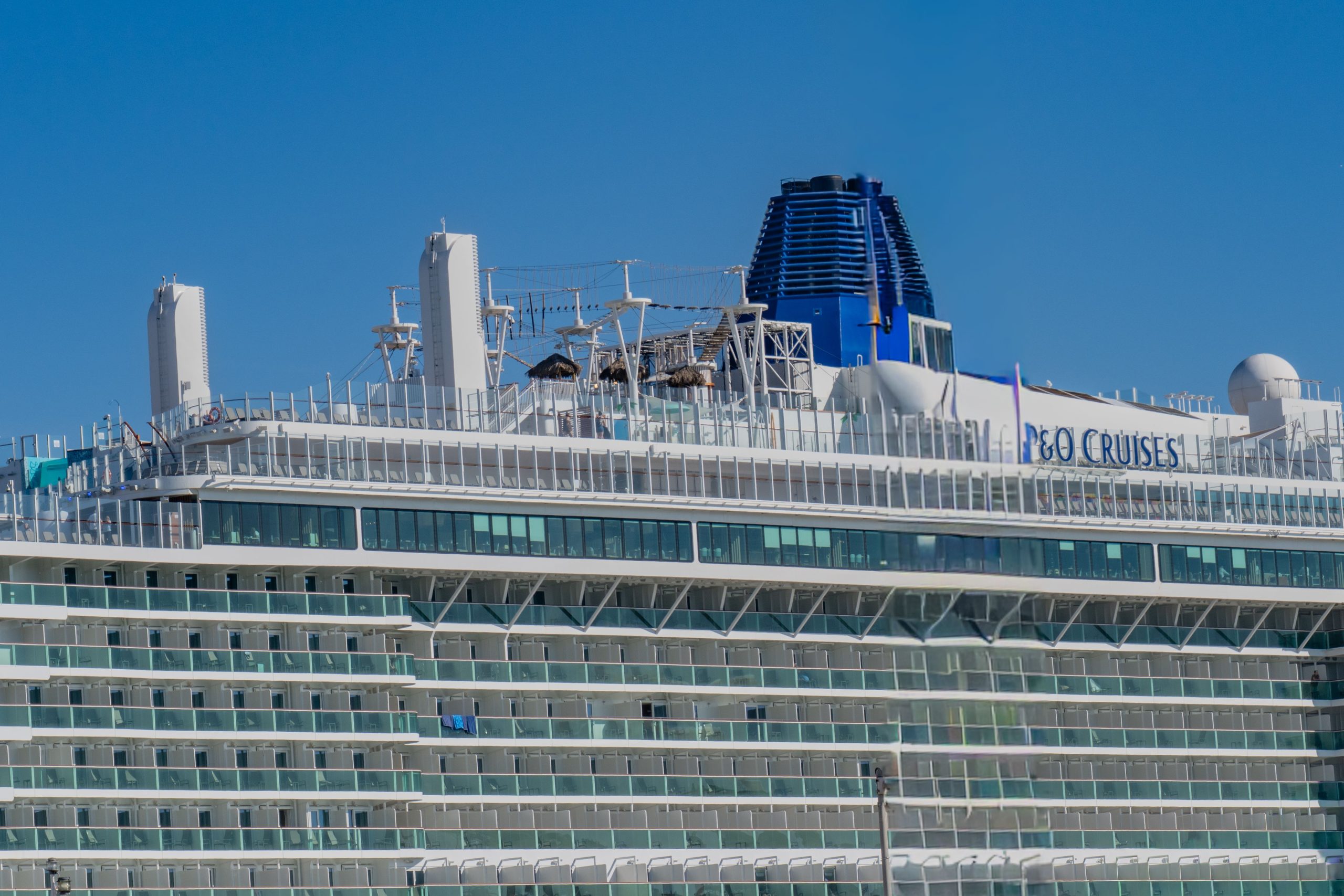 The cruise ship is getting ready to sail away.